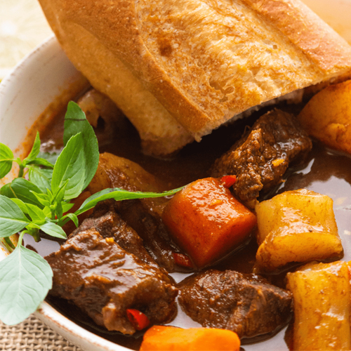 A bowl of Bo Kho with bread